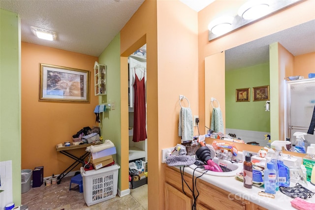 bathroom with a textured ceiling