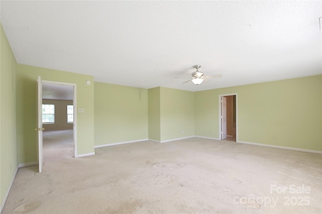 1114 Fenwick Ct, Clover, SC 29710 - unfurnished room with baseboards, ceiling fan, light carpet, and a textured ceiling