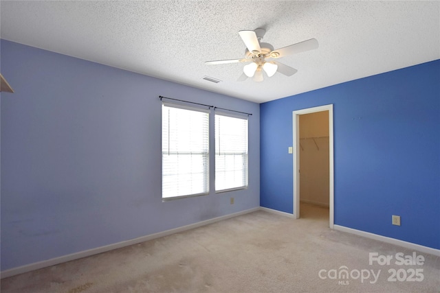 1114 Fenwick Ct, Clover, SC 29710 - spare room featuring visible vents, carpet floors, baseboards, a textured ceiling, and a ceiling fan