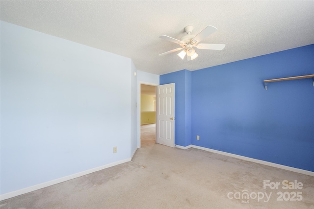 1114 Fenwick Ct, Clover, SC 29710 - spare room with baseboards, a ceiling fan, carpet, and a textured ceiling