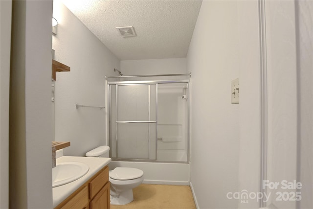 1114 Fenwick Ct, Clover, SC 29710 - full bath with a textured ceiling, visible vents, vanity, combined bath / shower with glass door, and toilet