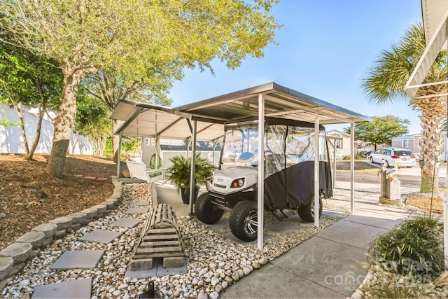 view of patio / terrace featuring a carport