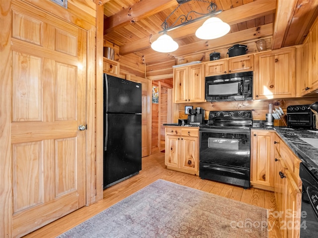 kitchen with beam ceiling, light wood-type flooring, hanging light fixtures, and black appliances