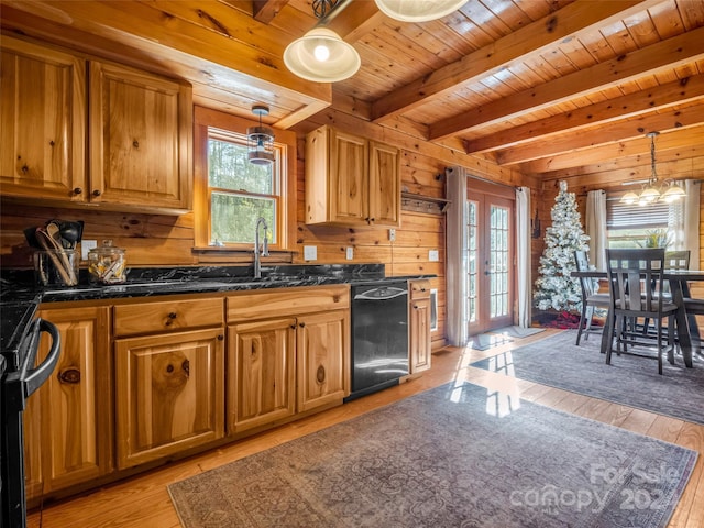 kitchen with wooden ceiling, wooden walls, beam ceiling, decorative light fixtures, and light hardwood / wood-style floors