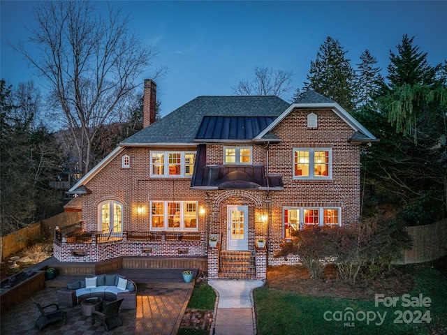 view of front of home with a patio area