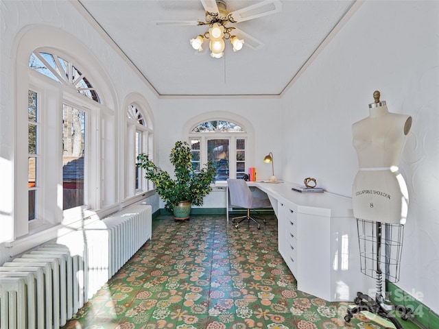 office area with french doors, radiator, crown molding, and ceiling fan