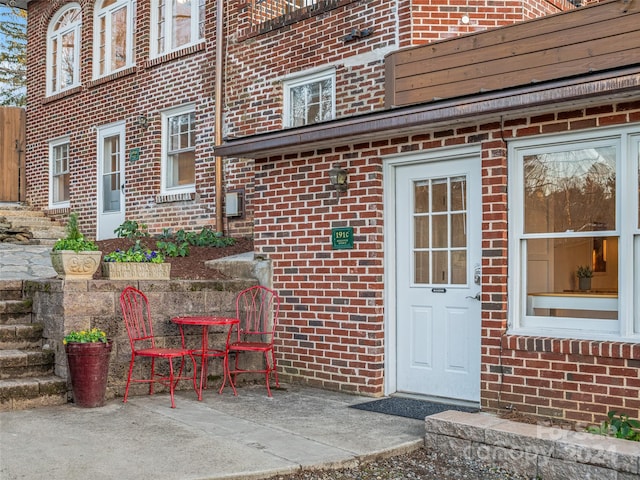 doorway to property featuring a patio area