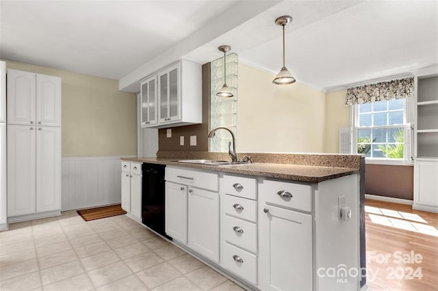 kitchen with dishwasher, sink, crown molding, decorative light fixtures, and white cabinets