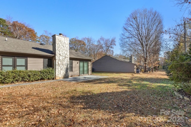 rear view of property featuring a patio