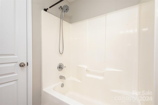 bathroom with shower / bathing tub combination