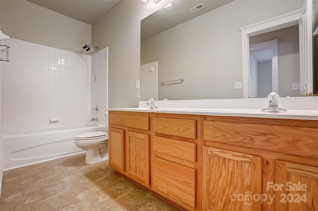 full bathroom with shower / bathing tub combination, vanity, toilet, and tile patterned flooring