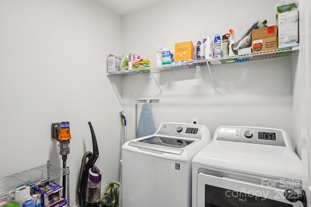 washroom featuring separate washer and dryer