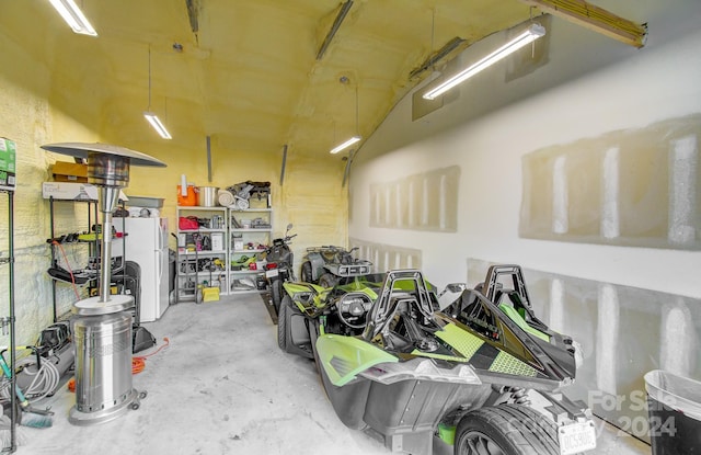 garage featuring white refrigerator