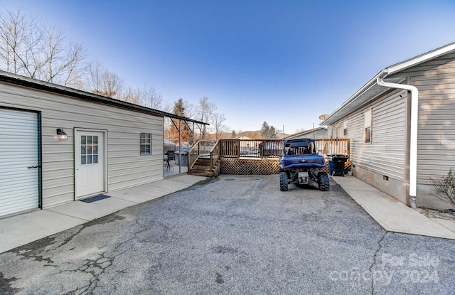 exterior space featuring a wooden deck