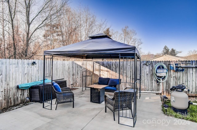 view of patio with a gazebo and an outdoor living space