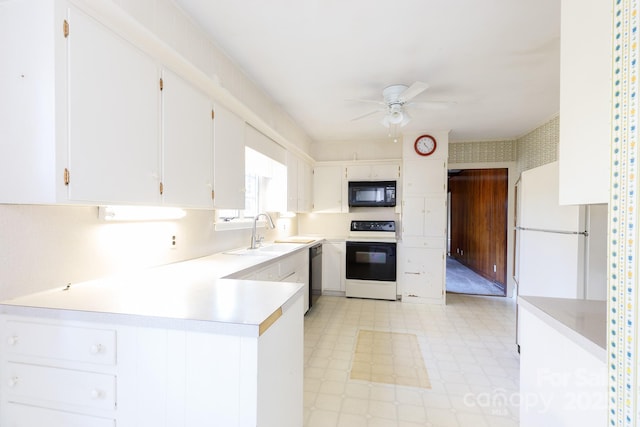 kitchen featuring white cabinetry, sink, ceiling fan, kitchen peninsula, and black appliances