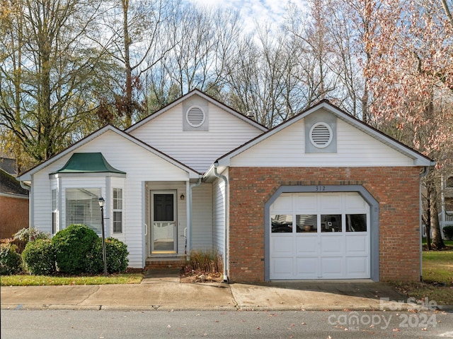 view of front of home with a garage