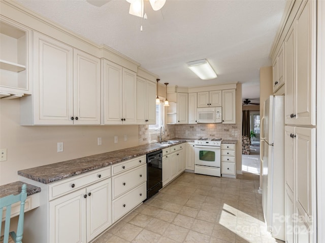 kitchen with ceiling fan, sink, tasteful backsplash, pendant lighting, and white appliances