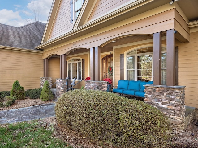 entrance to property featuring covered porch