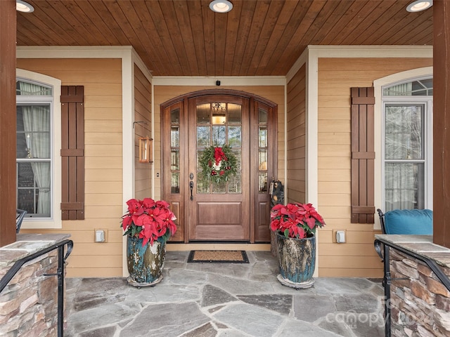 entrance to property with covered porch