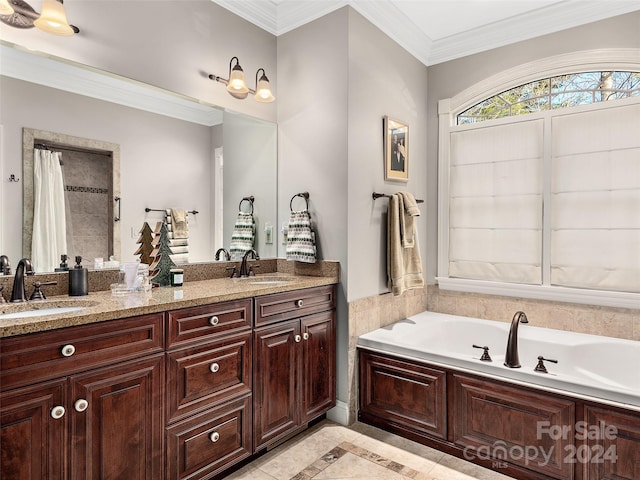 bathroom featuring crown molding, a bathtub, vanity, and tile patterned flooring