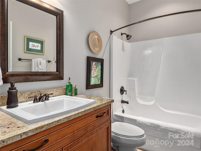 full bathroom featuring vanity, shower / bathtub combination, and toilet