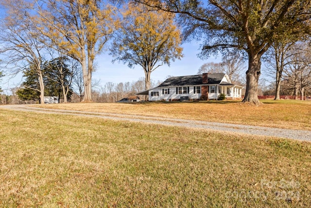 view of yard with covered porch