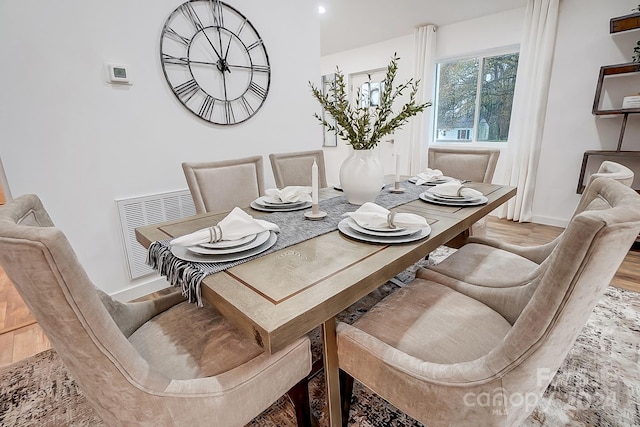 dining room with light wood-type flooring