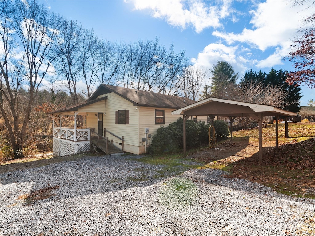 view of front of house with a carport