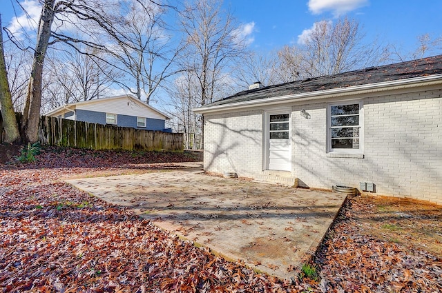 back of property featuring a patio area