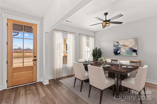 dining room with hardwood / wood-style floors and ceiling fan