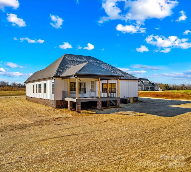 back of house with covered porch