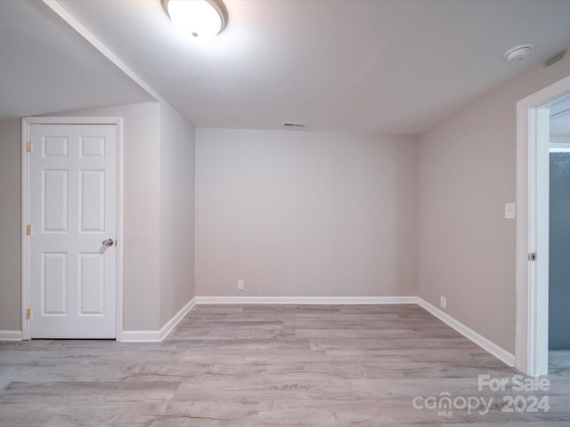 bonus room featuring light wood-type flooring