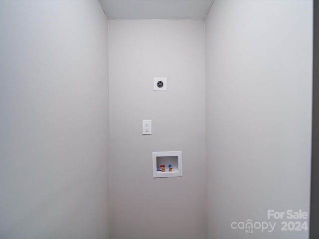 laundry area with electric dryer hookup and washer hookup