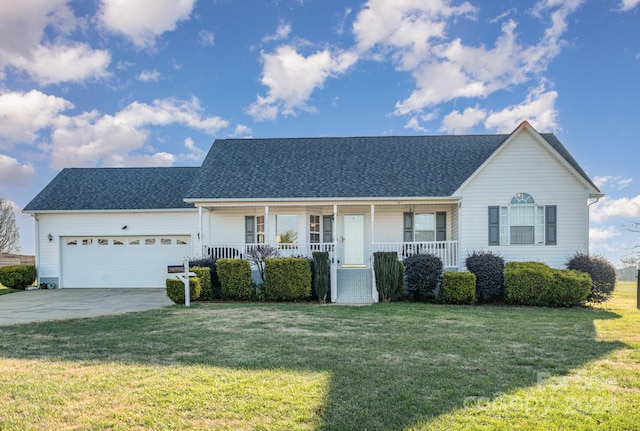 ranch-style house with a garage, covered porch, and a front lawn