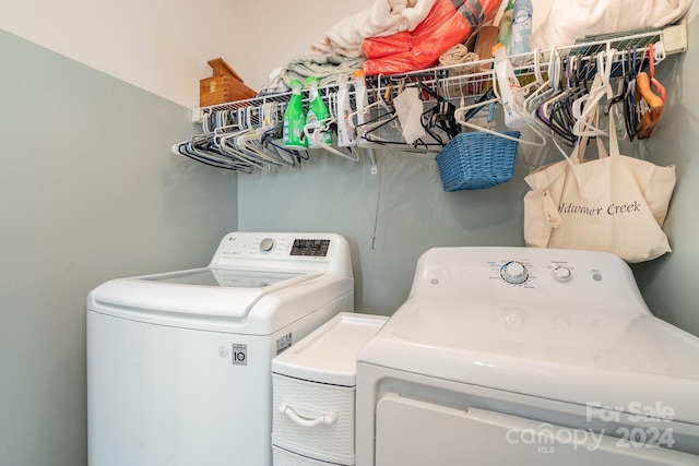 laundry room with separate washer and dryer