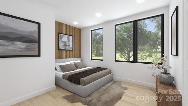 bedroom featuring light hardwood / wood-style flooring