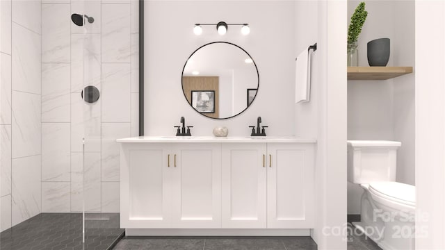 bathroom with vanity, a tile shower, and toilet