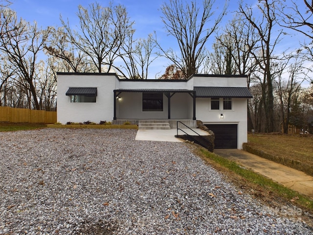 contemporary house featuring a garage