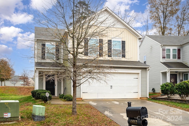 front of property featuring a garage