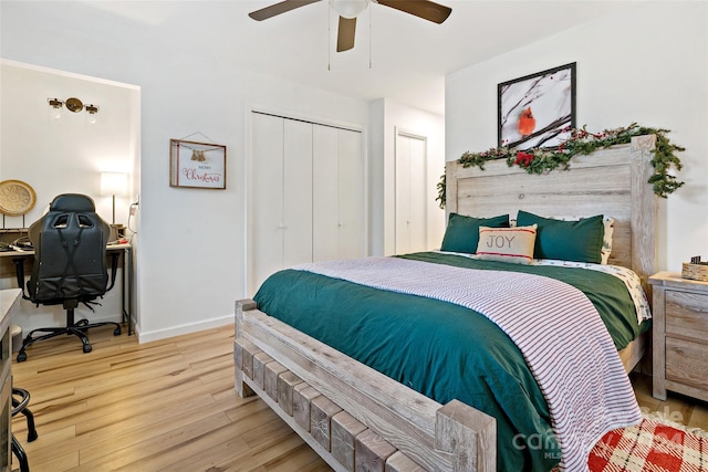 bedroom with ceiling fan, a closet, and light wood-type flooring