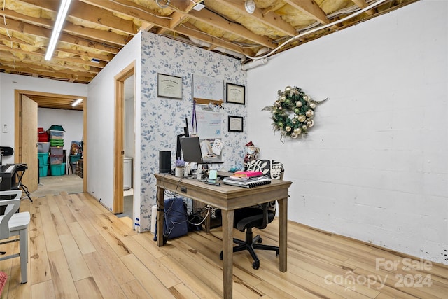 office area with hardwood / wood-style floors