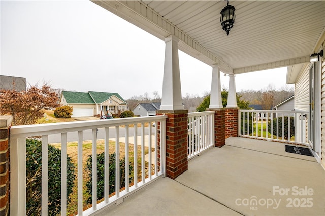 balcony featuring a porch