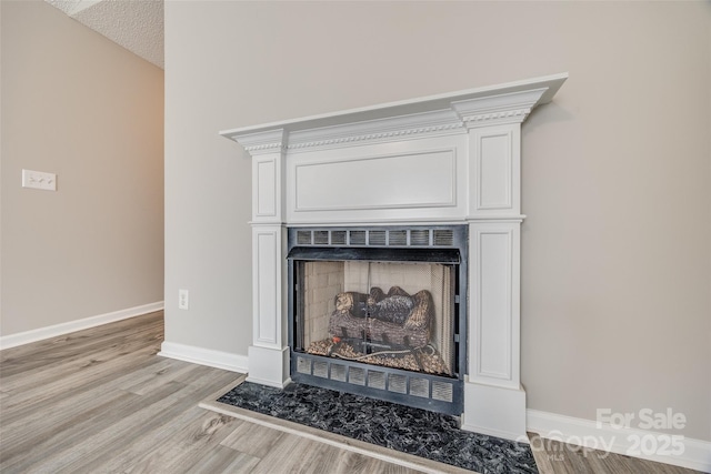 details featuring hardwood / wood-style flooring