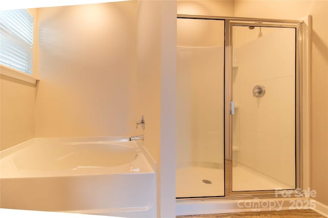 bathroom with independent shower and bath