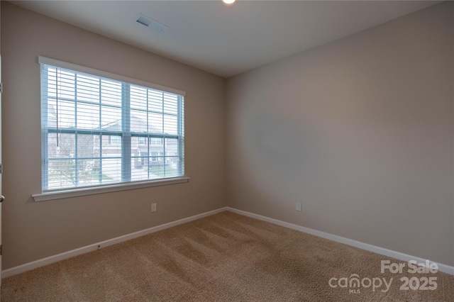 view of carpeted spare room