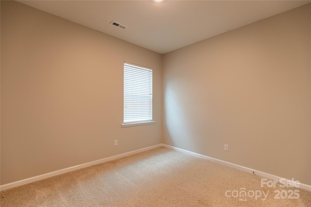 unfurnished room with carpet floors