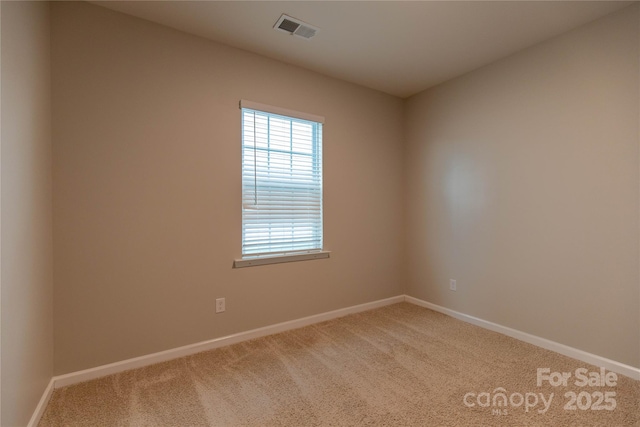 view of carpeted spare room