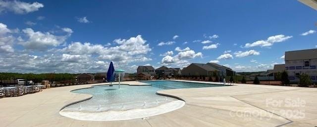 view of pool with a patio area