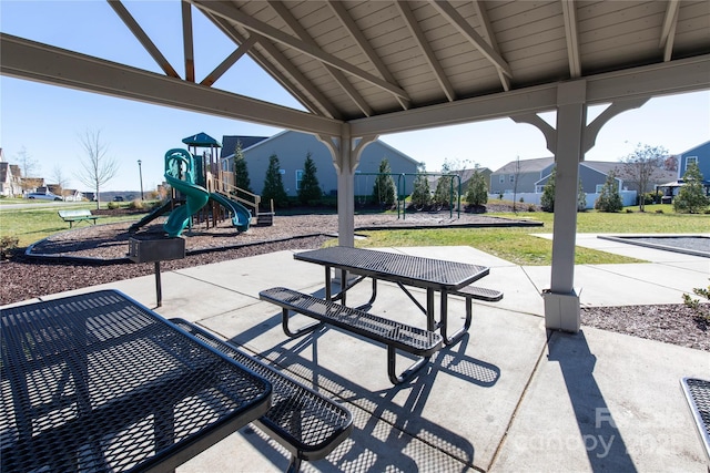 view of patio featuring a playground